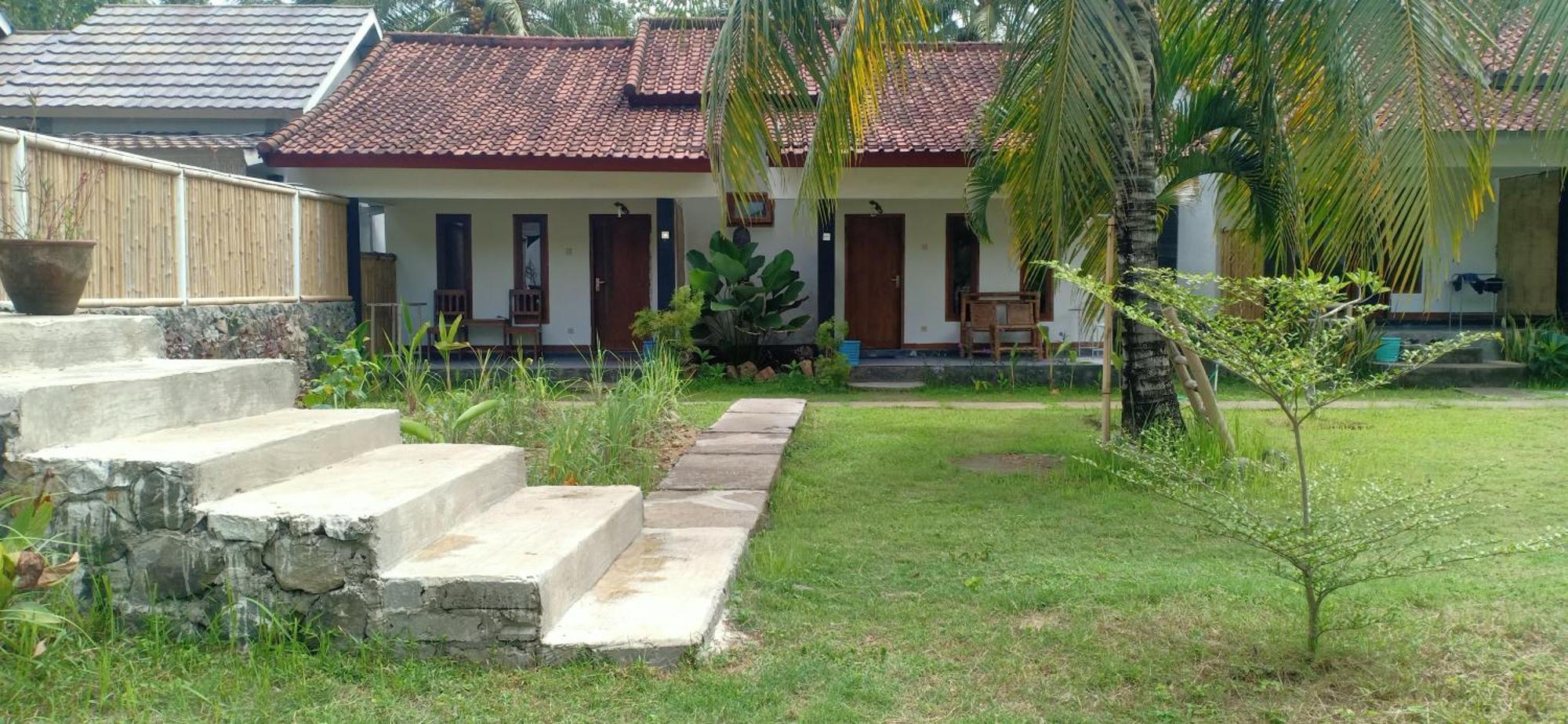 Kuta  Dewi Garden Guesthouse מראה חיצוני תמונה