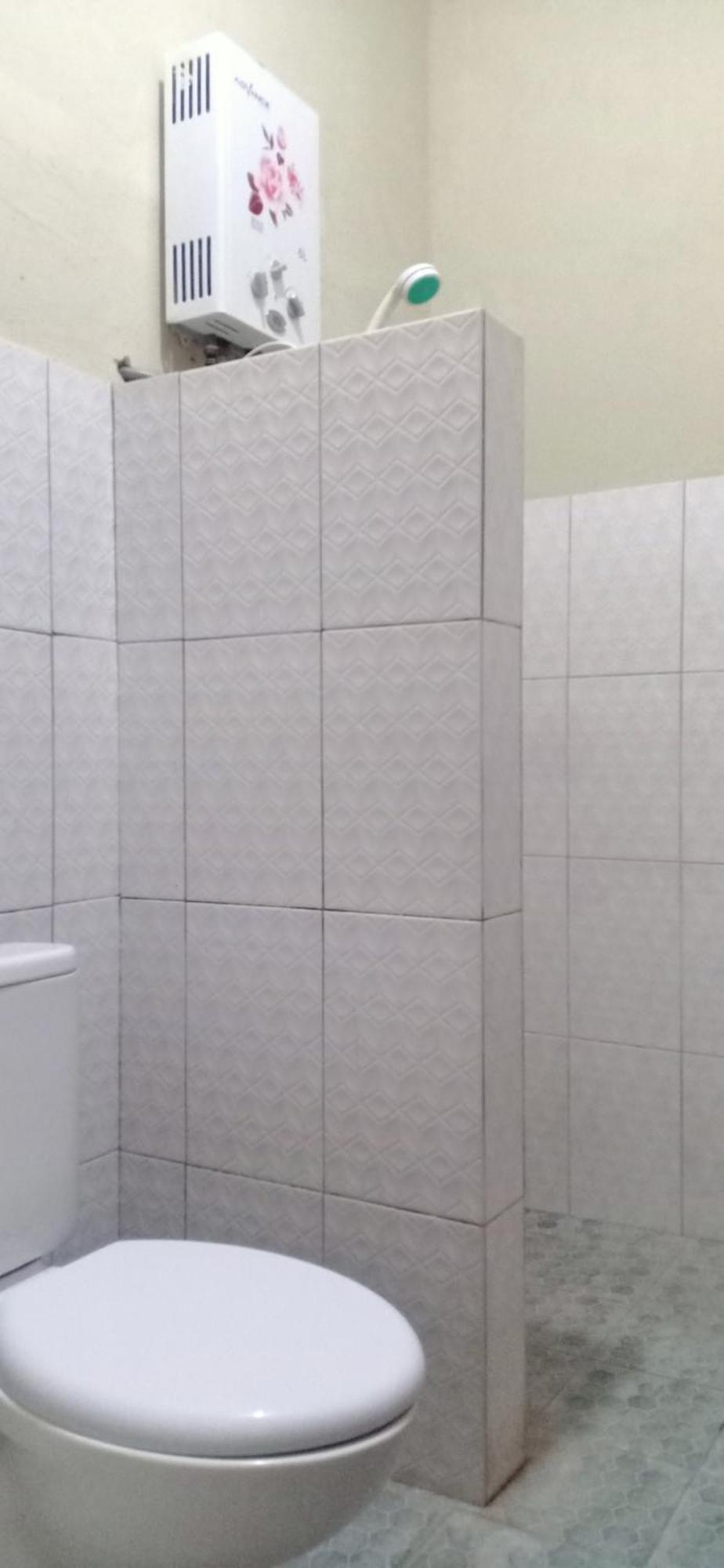 Kuta  Dewi Garden Guesthouse מראה חיצוני תמונה