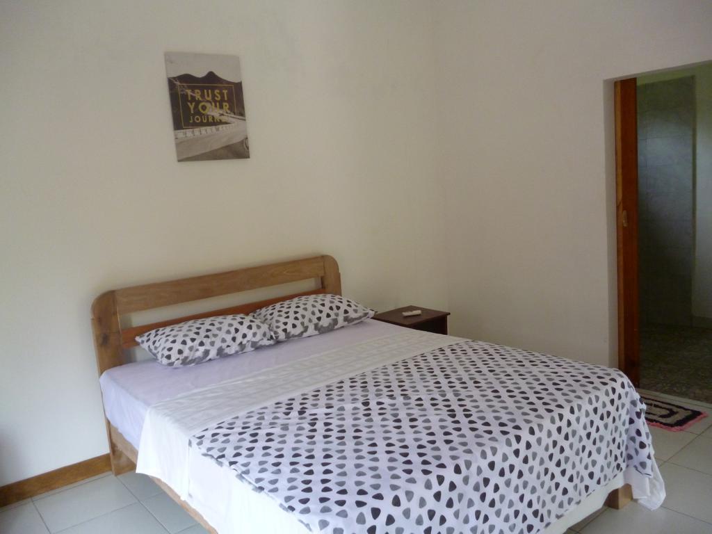 Kuta  Dewi Garden Guesthouse מראה חיצוני תמונה