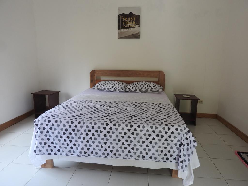 Kuta  Dewi Garden Guesthouse מראה חיצוני תמונה