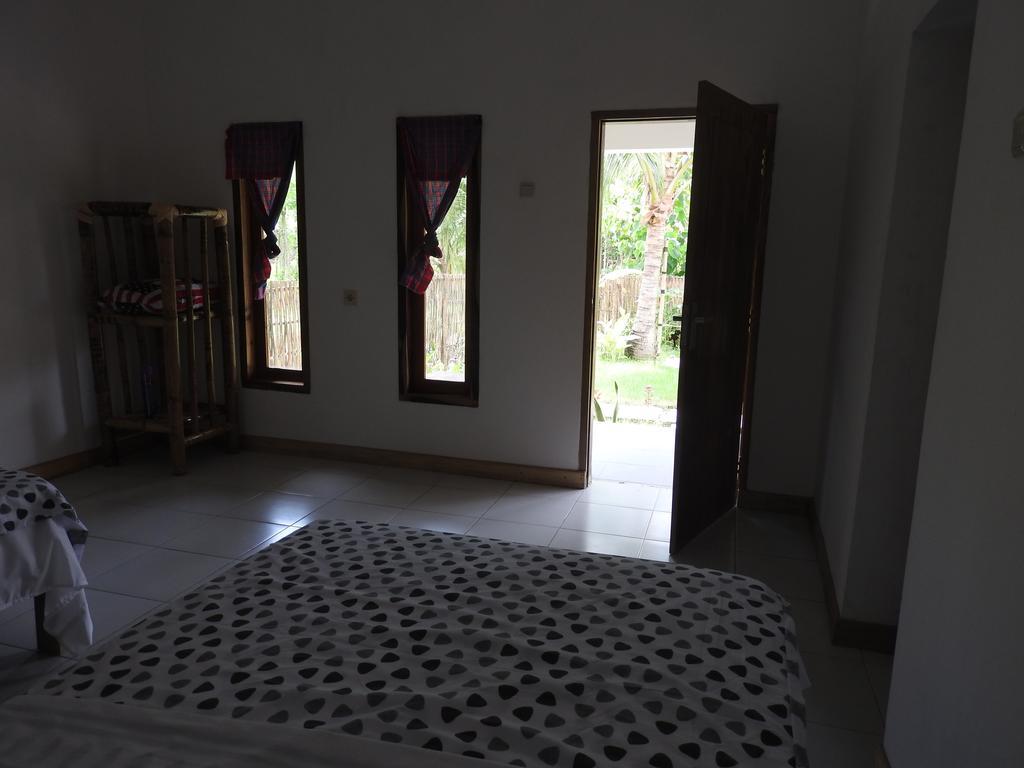 Kuta  Dewi Garden Guesthouse מראה חיצוני תמונה