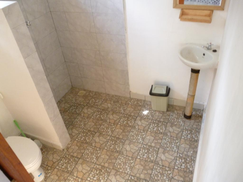 Kuta  Dewi Garden Guesthouse מראה חיצוני תמונה