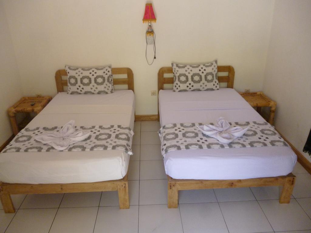 Kuta  Dewi Garden Guesthouse מראה חיצוני תמונה