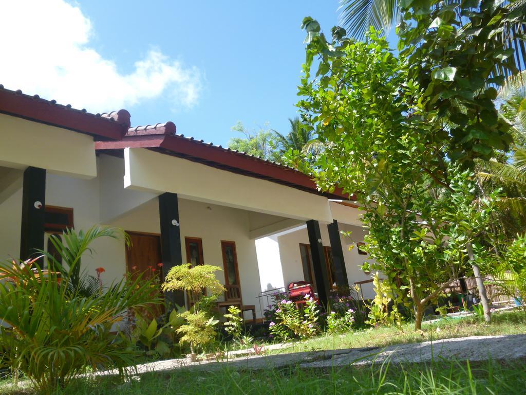Kuta  Dewi Garden Guesthouse מראה חיצוני תמונה