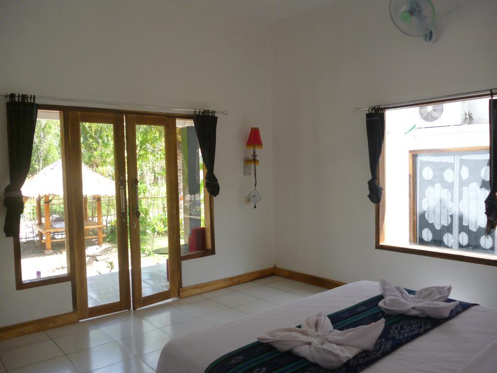 Kuta  Dewi Garden Guesthouse מראה חיצוני תמונה