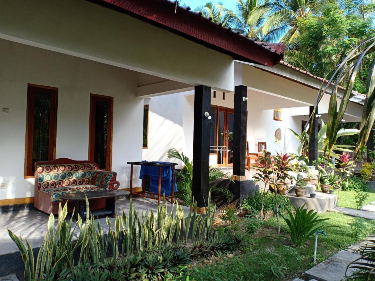 Kuta  Dewi Garden Guesthouse מראה חיצוני תמונה