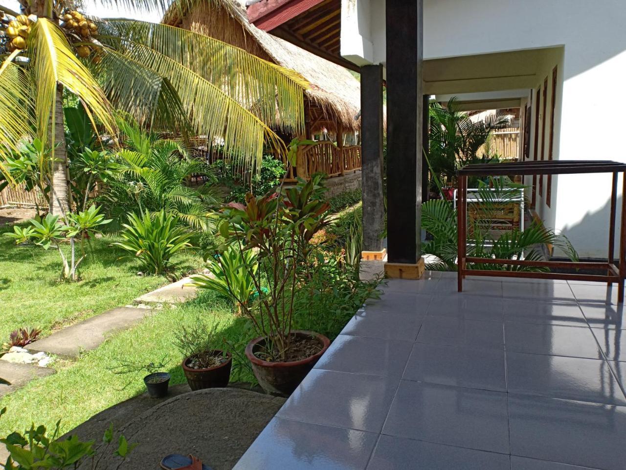 Kuta  Dewi Garden Guesthouse מראה חיצוני תמונה