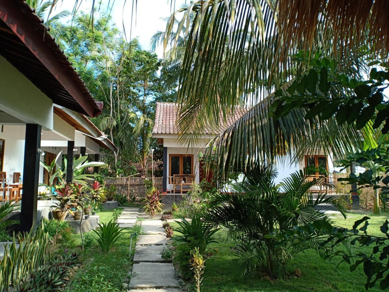 Kuta  Dewi Garden Guesthouse מראה חיצוני תמונה