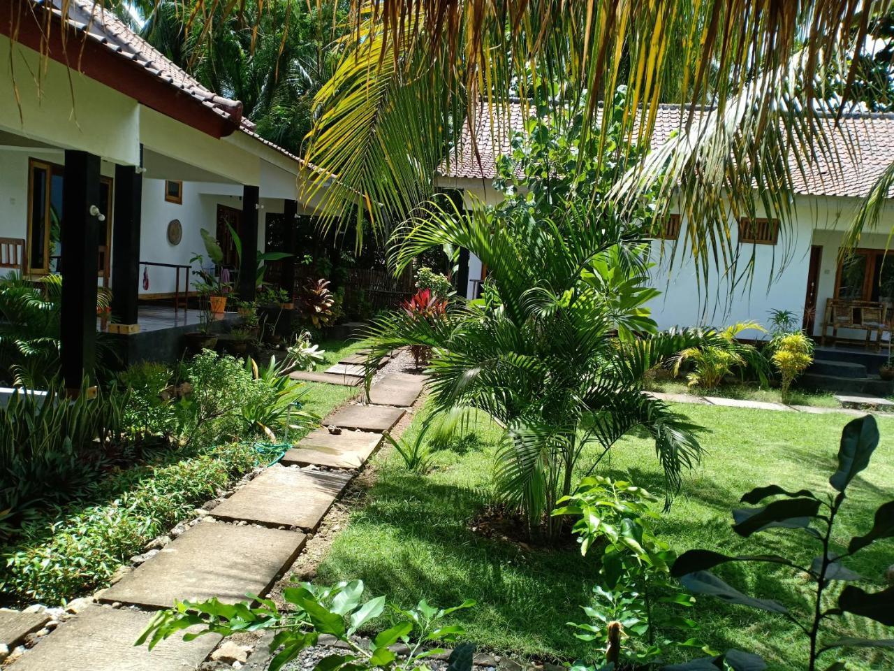 Kuta  Dewi Garden Guesthouse מראה חיצוני תמונה