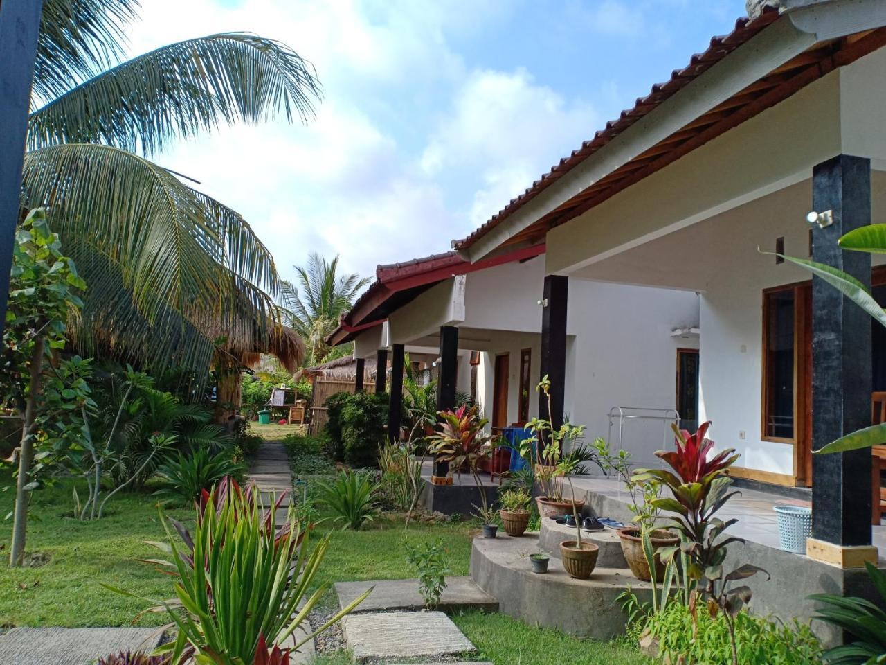 Kuta  Dewi Garden Guesthouse מראה חיצוני תמונה