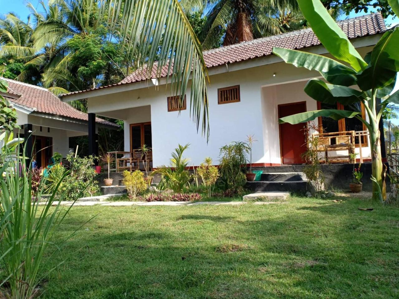 Kuta  Dewi Garden Guesthouse מראה חיצוני תמונה